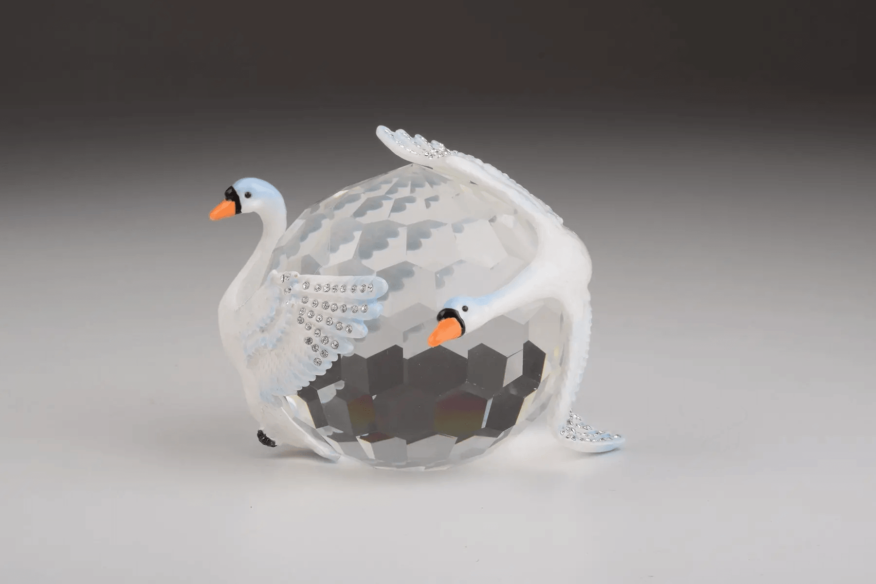 Two White Swans on Crystal Ball  